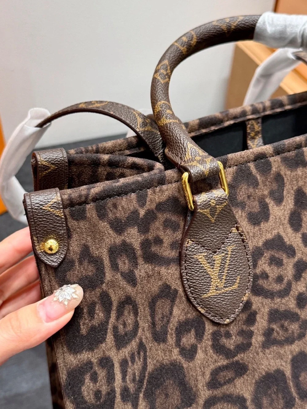 Louis Vuitton Leopard-Print Tote in Brown